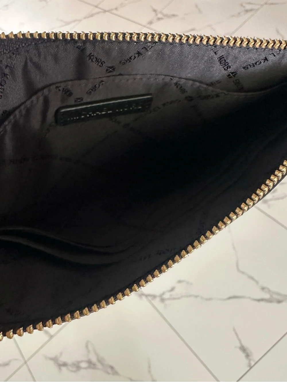 Michael Kors Black Pebbled Leather Wristlet with Gold Logo